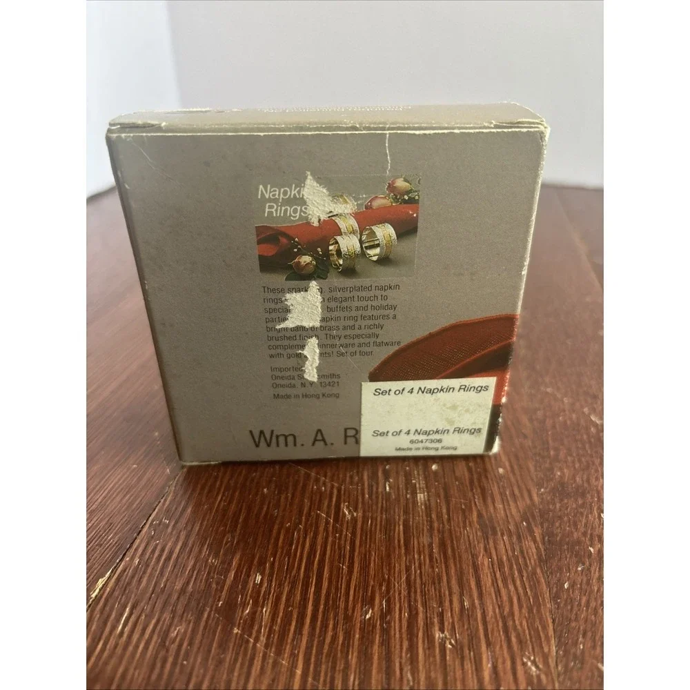 Wm. A. Rogers Napkin Rings Set of 4 Silver Plate with Brass New in Box 0117306